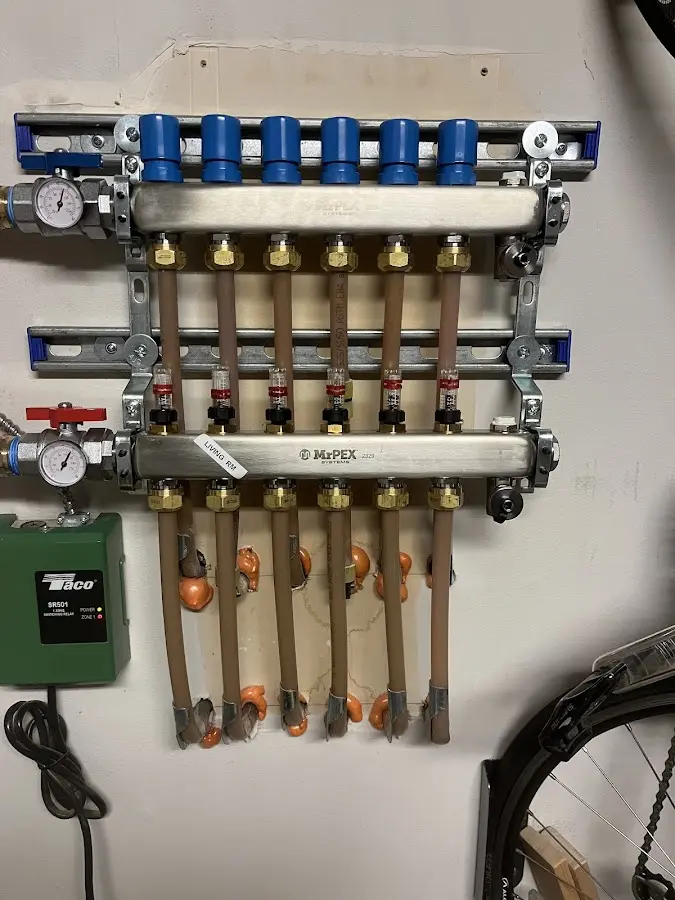 Plumber performing Gas Leak Detection at a residential property in Greenland